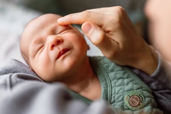 A newborn baby resting — family-building with Private Label Surrogacy