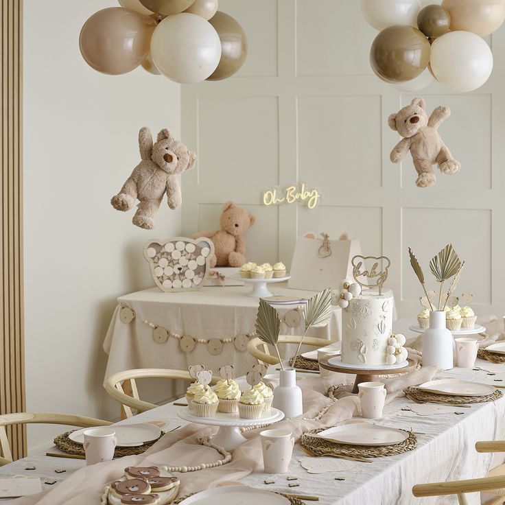 A softly lit baby shower table setting