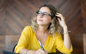 A woman reflecting thoughtfully
