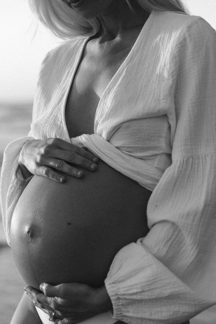 An expectant surrogate outdoors